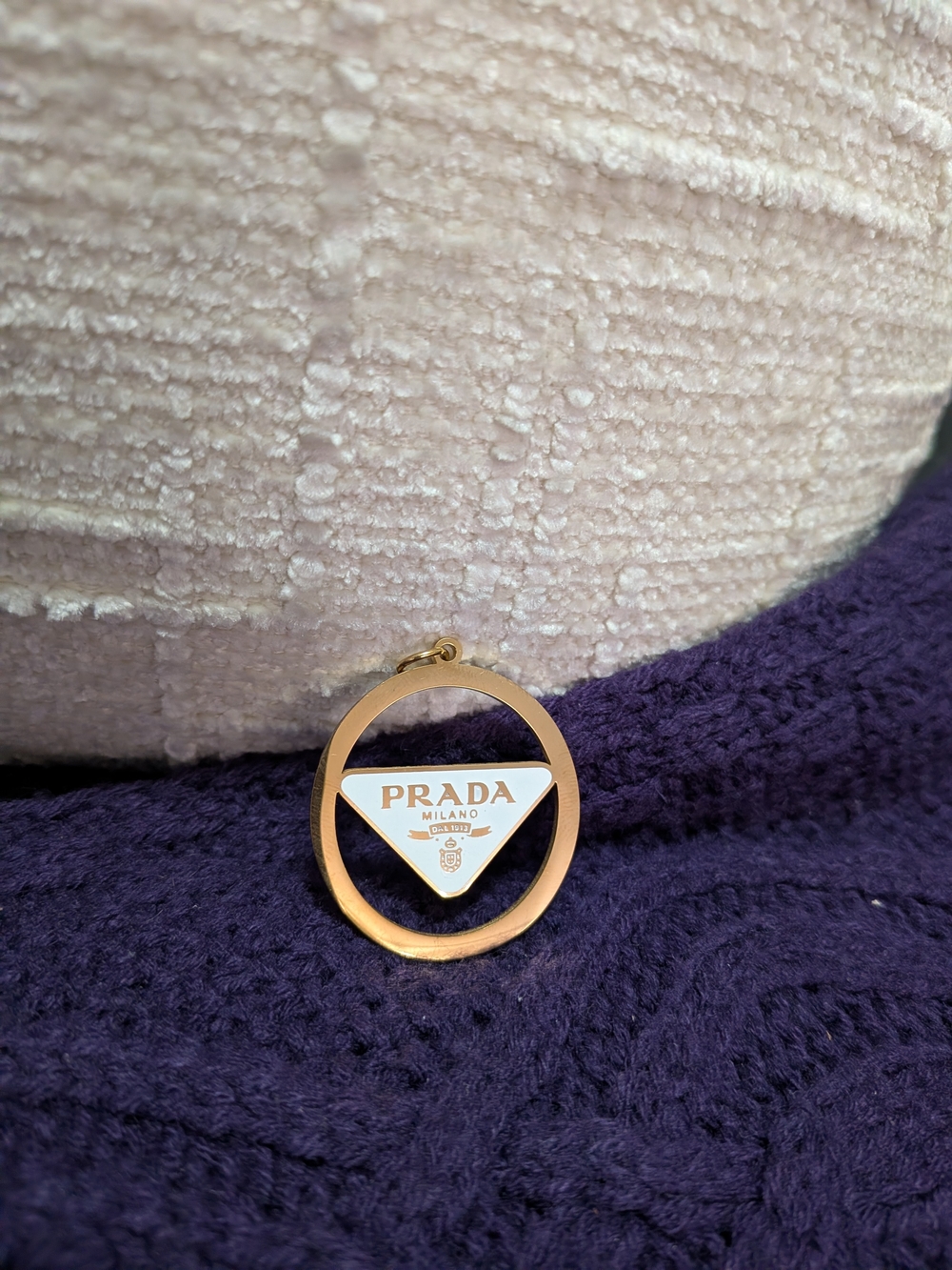 Gold-Tone Pendant with White Triangle Logo